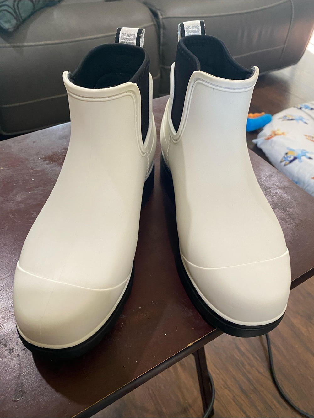 UGG Women’s WhiteRain Boots with Black Trim